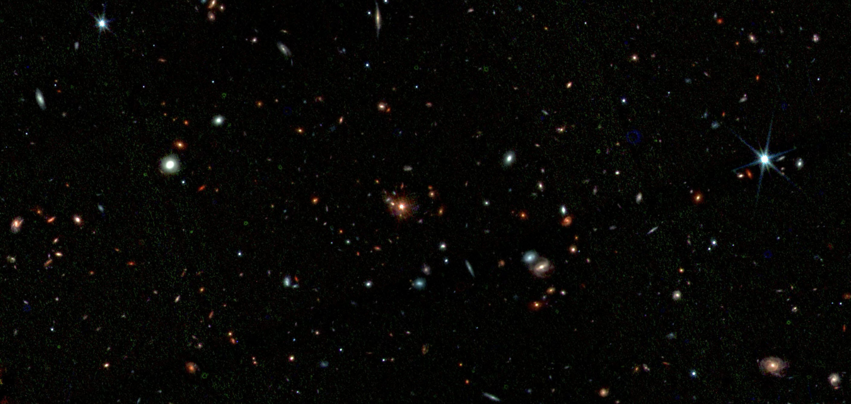 Strands from Cosmic Spiderweb Connect to Subaru Telescope Figure